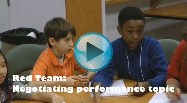 Video still of young performers