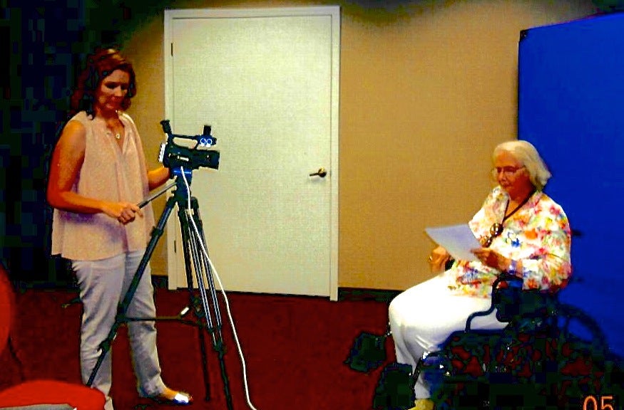 Amanda Melby, left, records member Francesca Jarvis at the May 21 conservatory workshop.