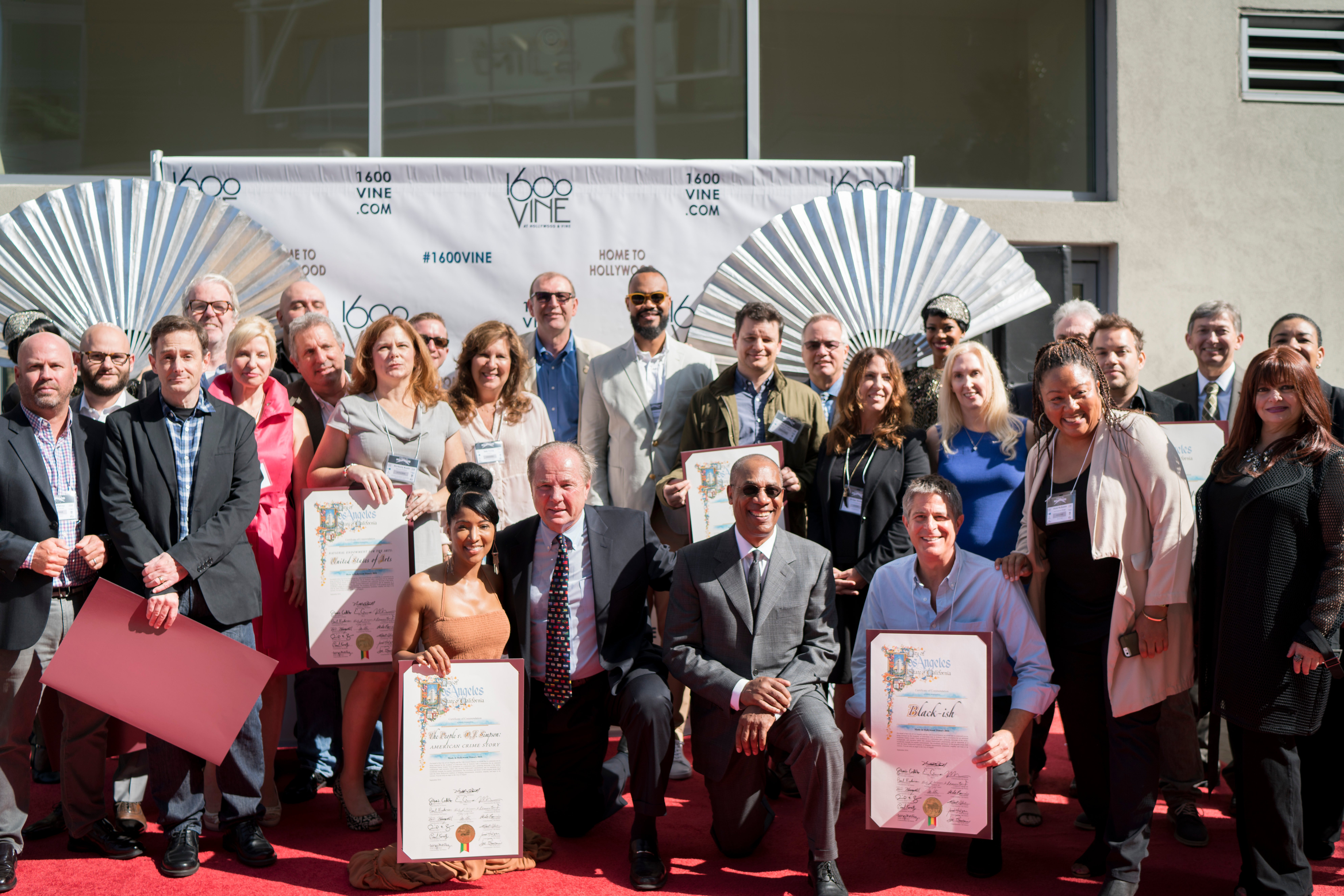 Former Los Angeles City Councilman Tom LaBonge and host Joe Morton joined by 2016 honorees. Photo by Riley Jamison. 