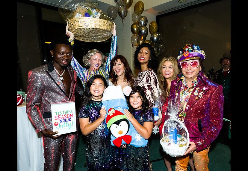 Ganadores de la competencia local de destellos navideños.
