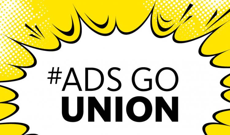 #AdsGoUnion en texto negro en una burbuja blanca sobre un fondo amarillo