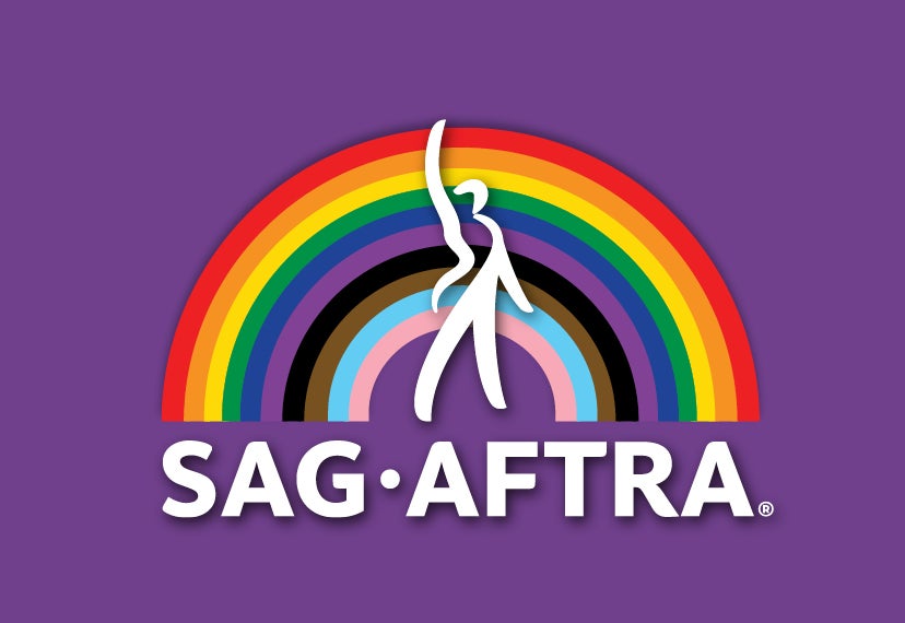 SAG-AFTRA logo standing in front of a rainbow on a purple background, the word "SAG-AFTRA" below it in white.