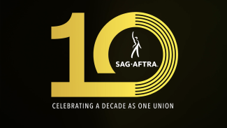 '10' in gold with the SAG-AFTRA logo in the middle of the 10 on an all black background. 'Celebrating a decade as one union' in white below the 10.