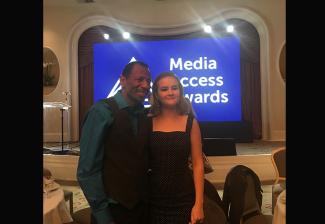 C.J. Jones, left, with member Millicent Simmonds 