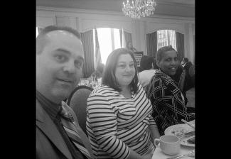 Local staff member Ellen Stoolmacher, center, joins board members Chuck Slavin and Andrea Lyman at the GBLC Annual Legislative Breakfast. (Photo by Philip H. Wachsler)