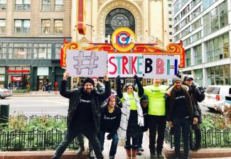 SAG-AFTRA Chicago Local members strike a pose for the #StrikeBBH  campaign in front of the Chicago Theater.