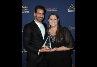 SAG-AFTRA Secretary-Treasurer Camryn Manheim, right, and actor and deaf community advocate Nyle DiMarco on Nov. 14. DiMarco received the Harold Russell Award at this year’s ceremony.