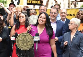 City Council members Carmen De La Rosa and Amanda Farias outside City Hall on Aug. 1