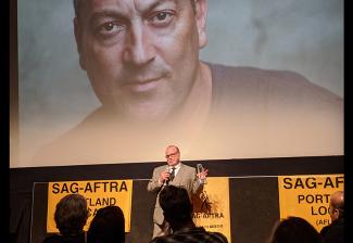 Portland Awards Committee member Danny Bruno presents the inaugural Robert Blanche Service Award at the 2020 SAG Awards Viewing Party. Photo by Harold Phillips.