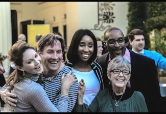 Members of the Los Angeles Local show off big smiles outside the Alex Theatre. 