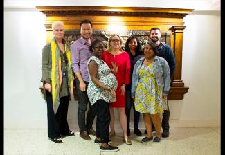 From left, Al Jazeera English employees Kira Rockell, Lister Lim, Ayana Brickhouse, Kimberly Halkett, Kavitha Chekuru, Anar Virji and Mike LaBella after a long night of negotiations.