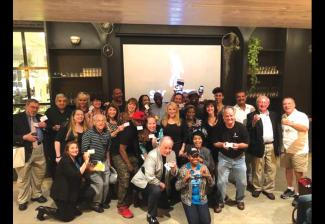 New Orleans Local members, arranged in 4 lines, show their cards.