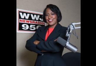 SAG-AFTRA member, broadcaster and Journalism Hall of Fame inductee Vickie Thomas standing tall in the WWJ Newsradio studio.