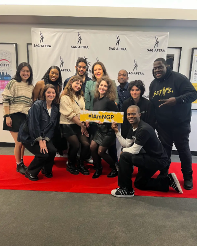 SAG-AFTRA New York Local members and their guests pose with SAG-AFTRA Executive Vice President and New York Local Vice President Linda Powell, back row, center, and New York NextGen Performers Co-chair Sarah Seeds, front row, center, on the red carpet during the 2025 NextGen Performers Meet-and-Greet.