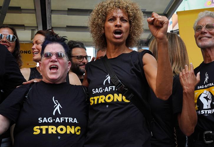 Lea DeLaria and Michelle Hurd at ‘Rock the City for a Fair Contract’ in Times Square on July 25.