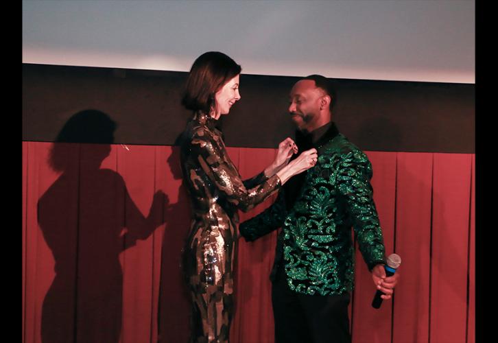 Ceejay Joseph, SAG-AFTRA Houston-Austin Local’s newest member, receives a warm welcome and his SAG-AFTRA pin from Local President Mykle McCoslin. Photo by SuperCybers
