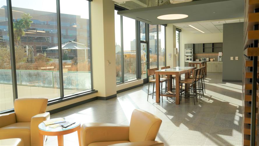 Kitchen with large windows and natural lighting. 