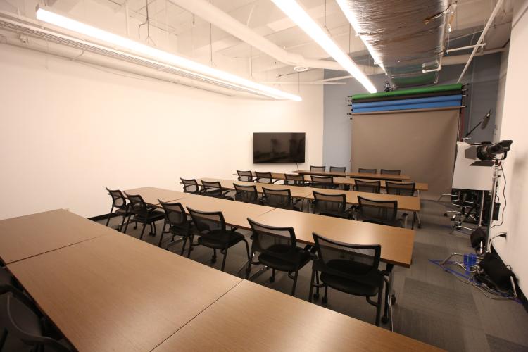 Room with classroom style seating.