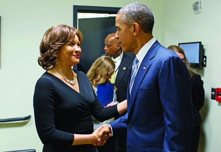 Alicia Cole with former President Obama.