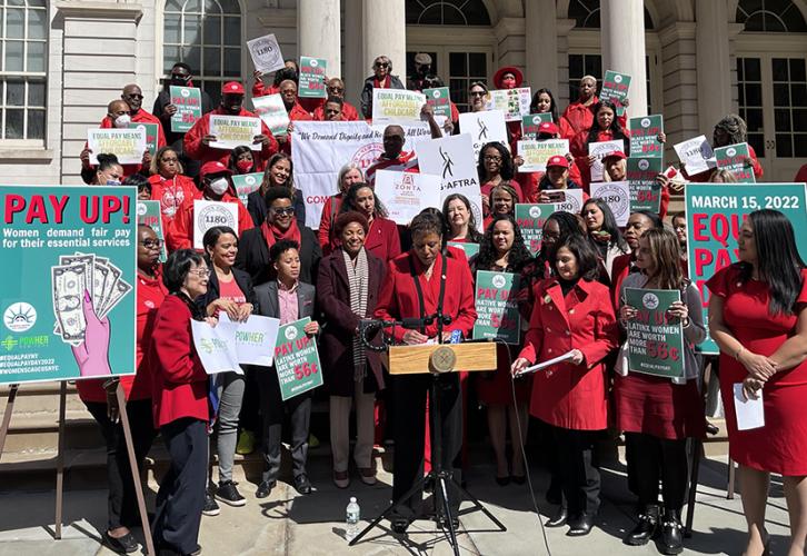 New York City Council Speaker Adrienne Adams, center, addresses attendees of the Equal Pay Day Rally at City Hall.