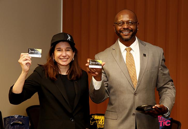 SAG-AFTRA New York WNY/CNY Co-chairs Louise Simon Schoene and Joe Wooley show their cards. Photo by Cheryl Gorski