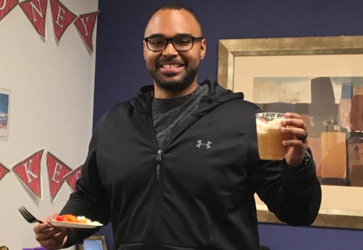 Member Troy Pryor enjoys butterbeer during September’s Harry Potter-themed Game Night.