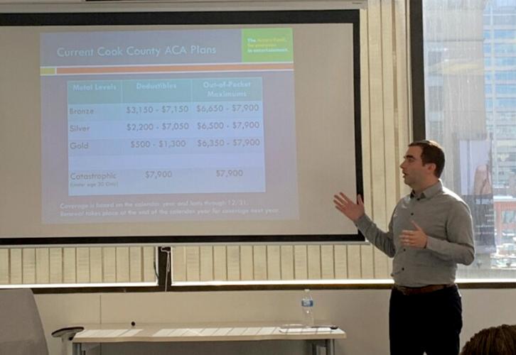 Musolino conducting the health insurance seminar. Photo by Ashley J. Dearborn.