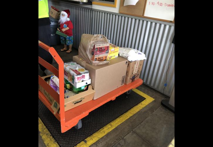Some of the more than 180 pounds of food that Hawaii Local Board members helped collect during the drive-through food drive.