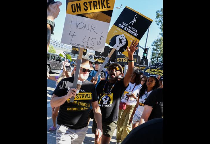 SAG-AFTRA members and allies walk the Disney picket line on Nov. 1 to mark 111 days on strike against the AMPTP.