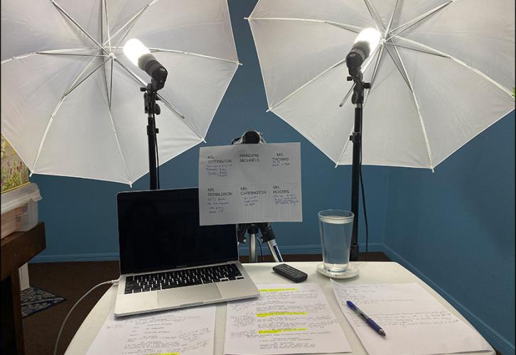 The lighting and "camera" set up—complete with seating chart for easy reference!