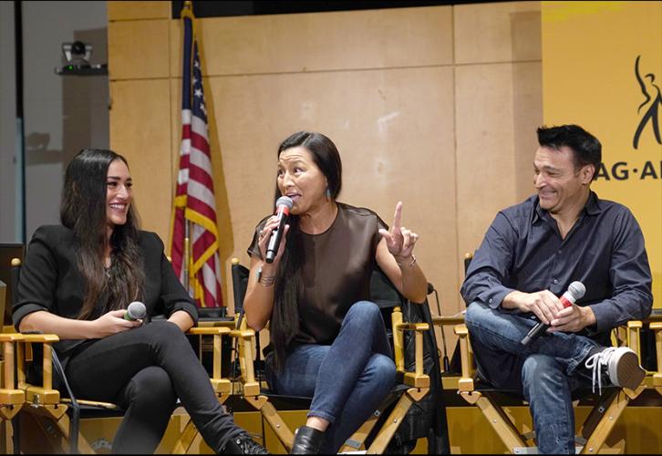An anecdote from SAG-AFTRA member Kimberly Guerrero, center, draws laughter from fellow performer Q’orianka Kilcher, left, and WGA writer Jason Gavin. 