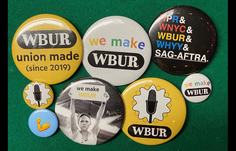 A collection of WBUR buttons from their organizing campaign, #WeMakeWBUR.