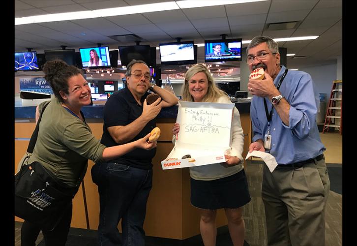 From left, Philadelphia Local members from the KYW Newsradio team Haddas Kuznits, Dave Madden, Michelle Durham and Mike Dinardor with their donuts. 