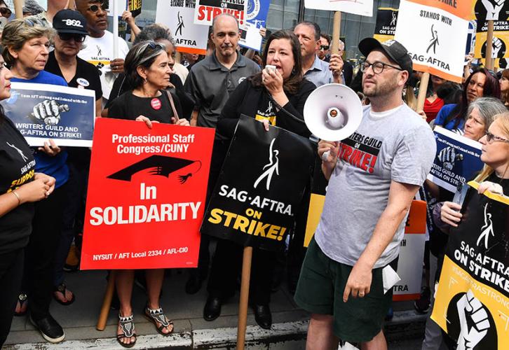 Executive Director, New York Local, Labor Policy and International Affairs Rebecca Damon speaks to the picketers.