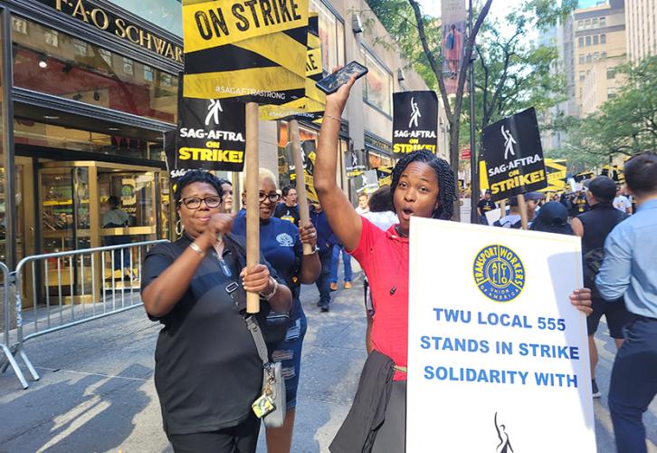 SAG-AFTRA and TWU members on the picket line.
