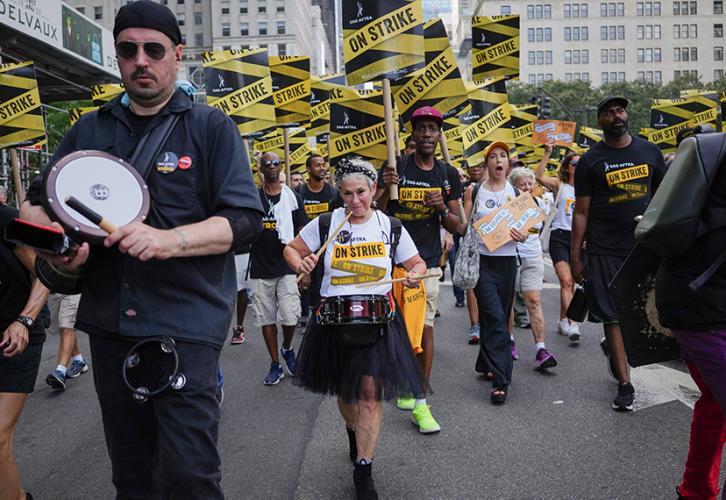 SAG-AFTRA members drum their way up Fifth Avenue. Derek French| Shutterstock for SAG-AFTRA.