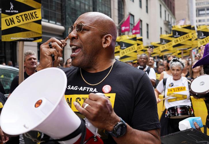 New York Local President Ezra Knight welcomes SAG-AFTRA members as they prepare to march up Fifth Avenue on Sept. 9.  Photo by Derek French | Shutterstock for SAG-AFTRA.