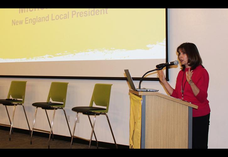 New England Local Board President Michelle Proude welcomes members to the annual meeting.