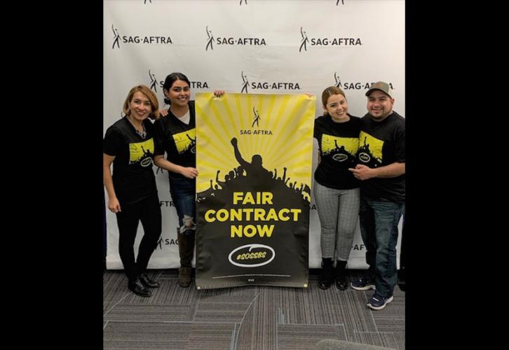 Chicago-based SBS bargaining unit members and La Ley broadcasters, from left, sports reporter Liz Jiménez, production assistant Iridian Fierro, midday DJ Diane Fong and ‘The Compa Marco’ host Marco Vargas on Feb. 24.