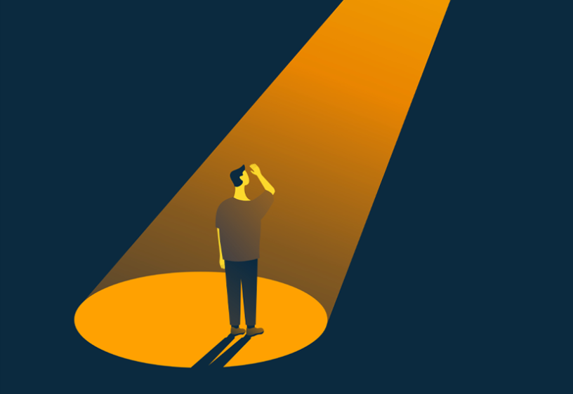 Illustration of a person standing in a spotlight
