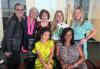 Top row, from left, National Board member Nancy Duerr, Janet Carabelli, Miami Local Vice President Ellen Wacher, Laurel Levey, Kelly Vaughn. Bottom row, Marcela Fernanda, left and Carol C. Bailey. A group of seven women, two seated, five standing, smile while posing in the SAG-AFTRA office.