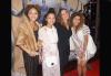 Three young girls and their mother on the red carpet. Three young girls and their mother on the red carpet.