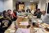 A large group of SAG-AFTRA New England Local members gathered at the Boston office for the NextGen Committee’s Vision Board Social on Jan. 15. A diverse group of eleven SAG-AFTRA members pose for a photo while sitting around a table in the SAG-AFTRA New England Local conference room.